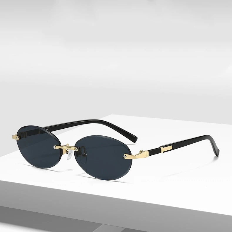 New Rimless Sunglasses Oval Fashion Popular Women Men Shades Small Ellipse Sun Glasses for Female Male Party Traveling Glasses