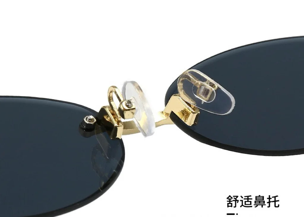 New Rimless Sunglasses Oval Fashion Popular Women Men Shades Small Ellipse Sun Glasses for Female Male Party Traveling Glasses